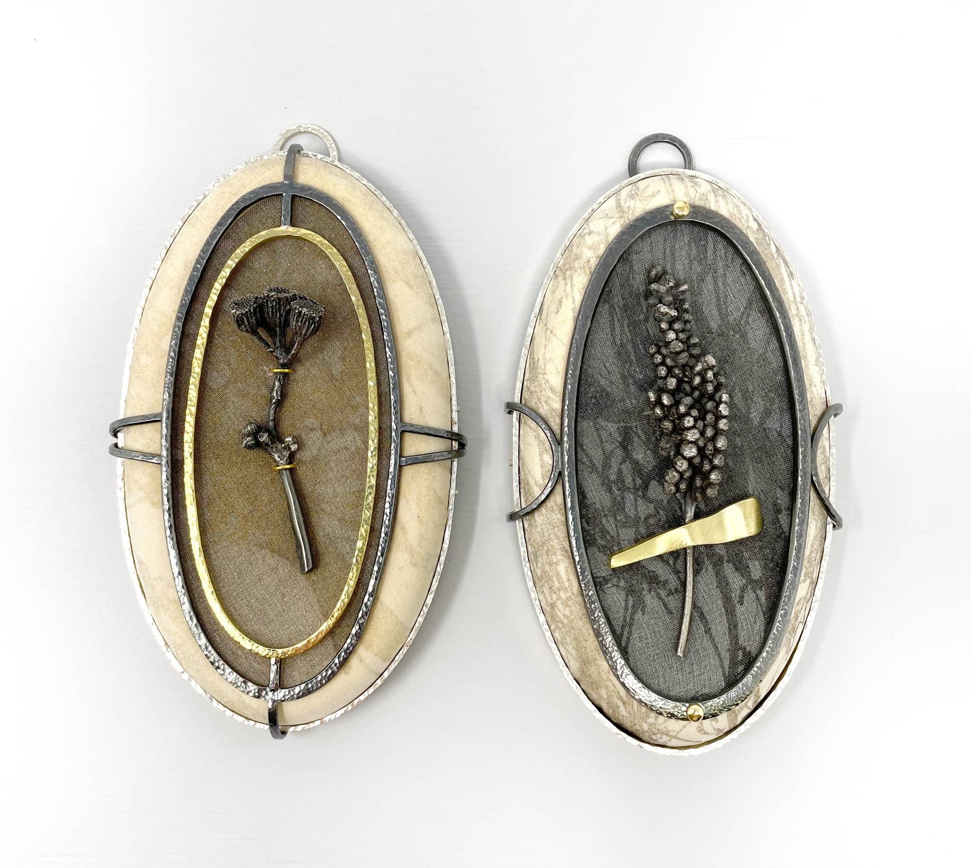 two metal pendants